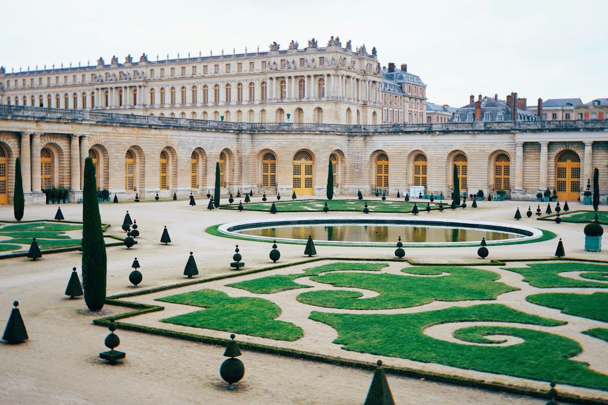 The Palace of Versailles with its grand facade and fountain