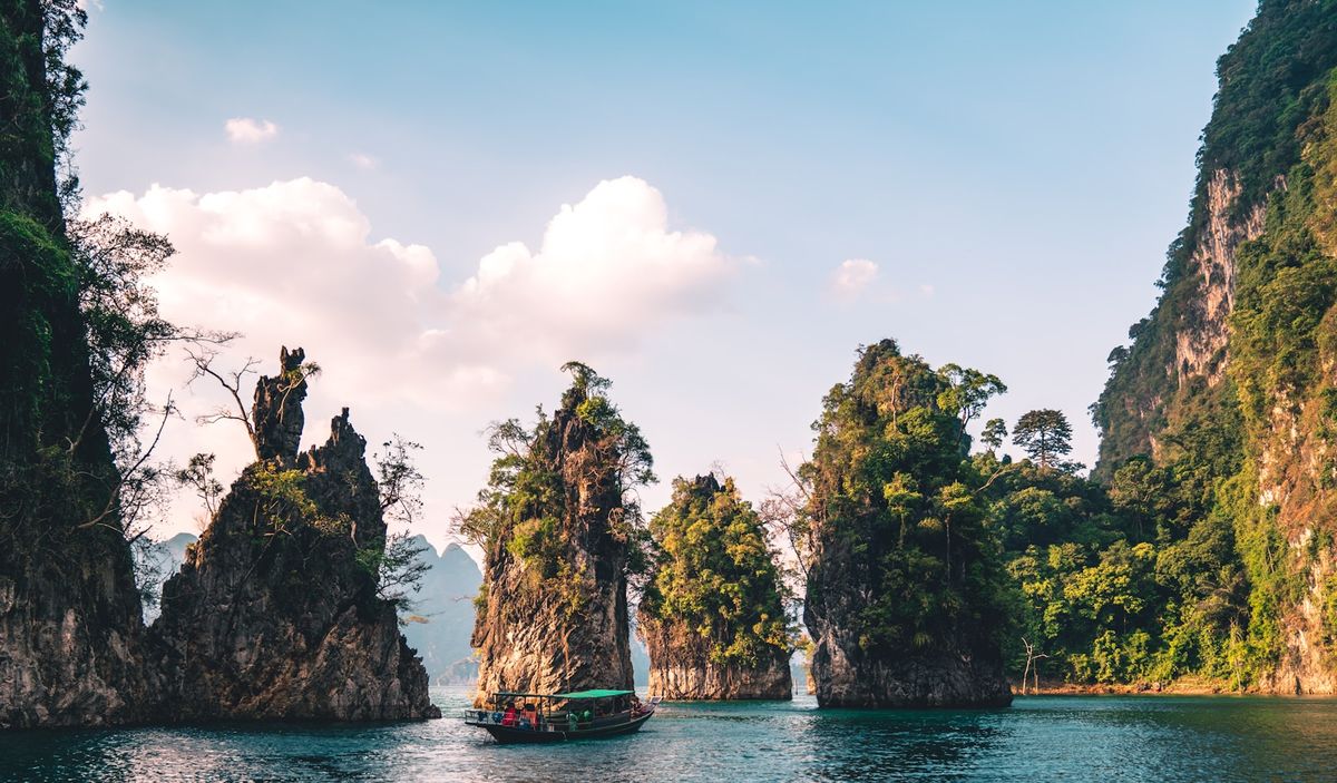 Scenery of limestone rock formations on the water near Krabi, Thailand