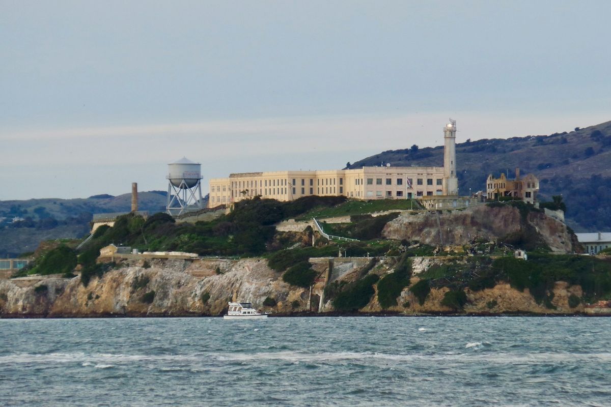 Alcatraz Island prison building sitting on a hill in San Francisco Bay