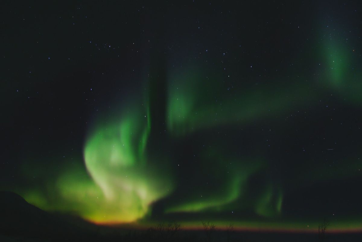 Northern lights aurora borealis over Arctic Sweden