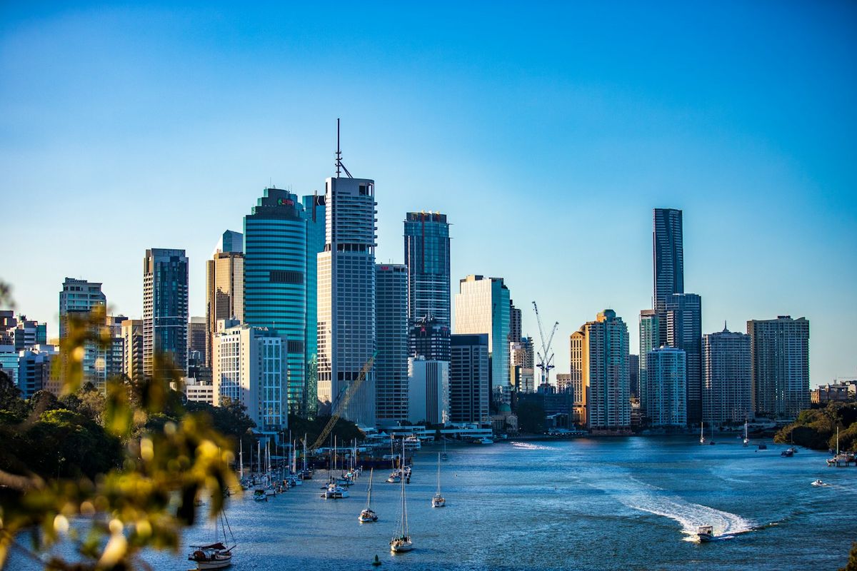 Brisbane city skyline under clear blue sky