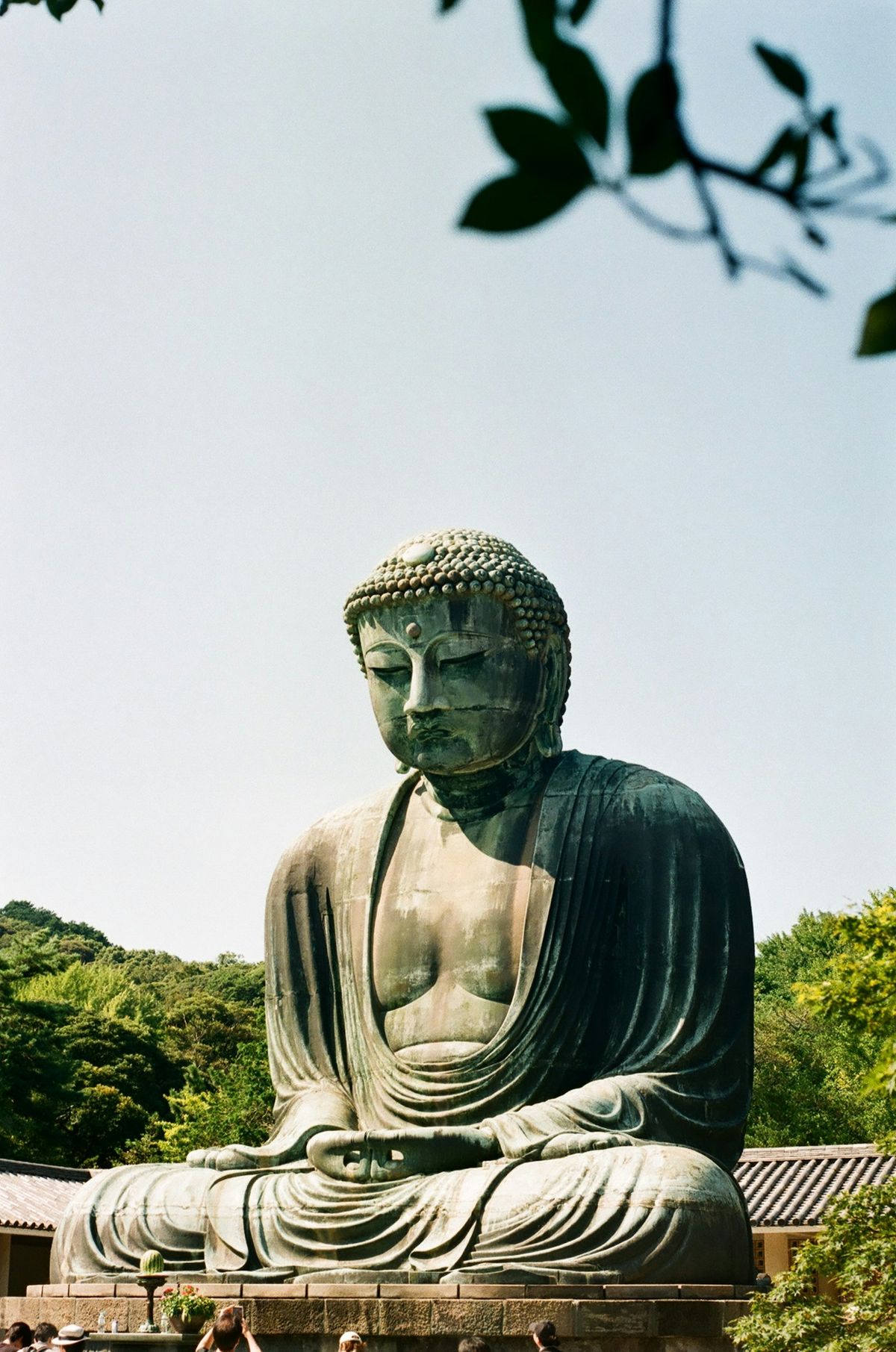The Great Buddha of Kamakura, a large bronze statue under a clear sky