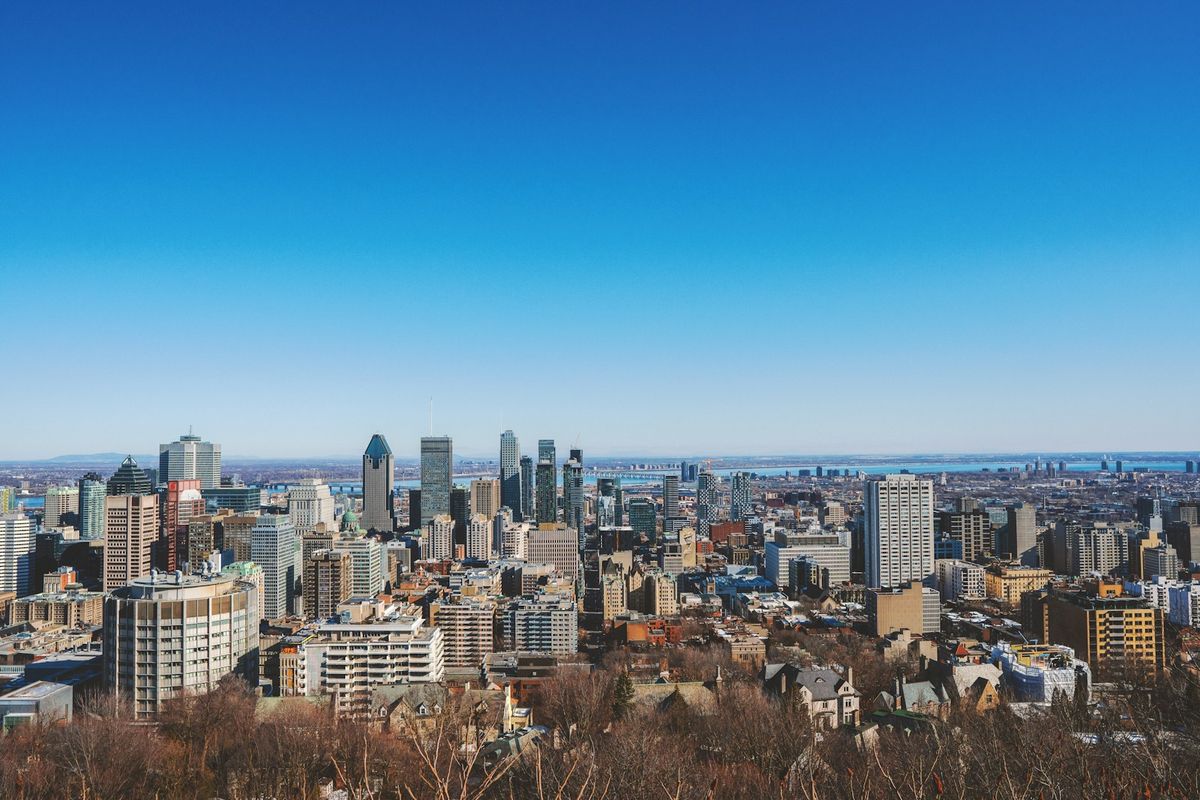 Montreal city skyline under blue sky daytime
