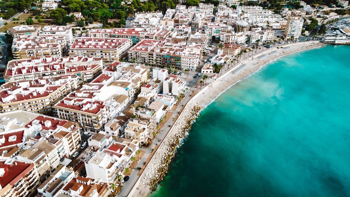 Aerial view of Valencia coastal city and sea