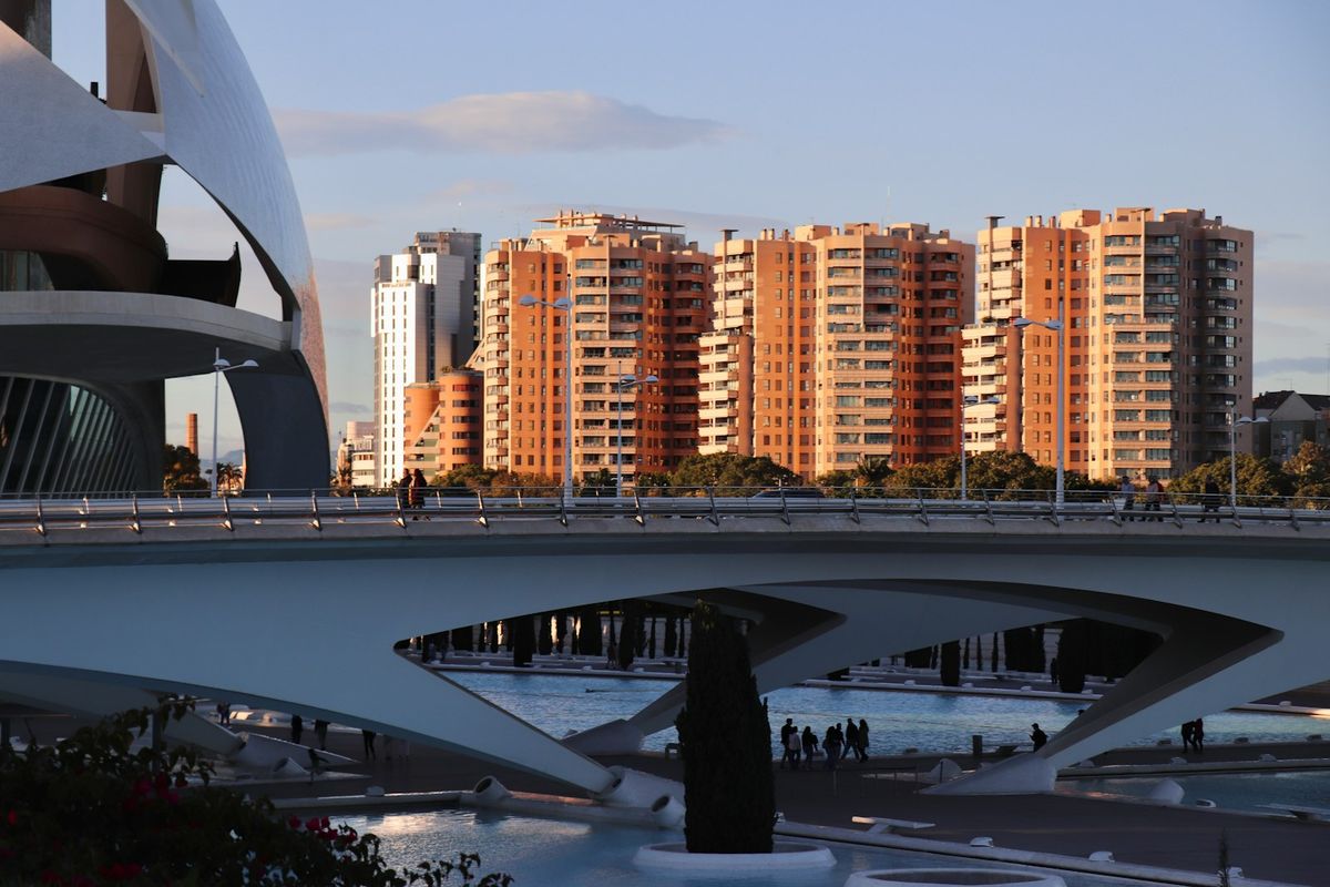 Modern architecture with buildings and bridge at sunset in Valencia