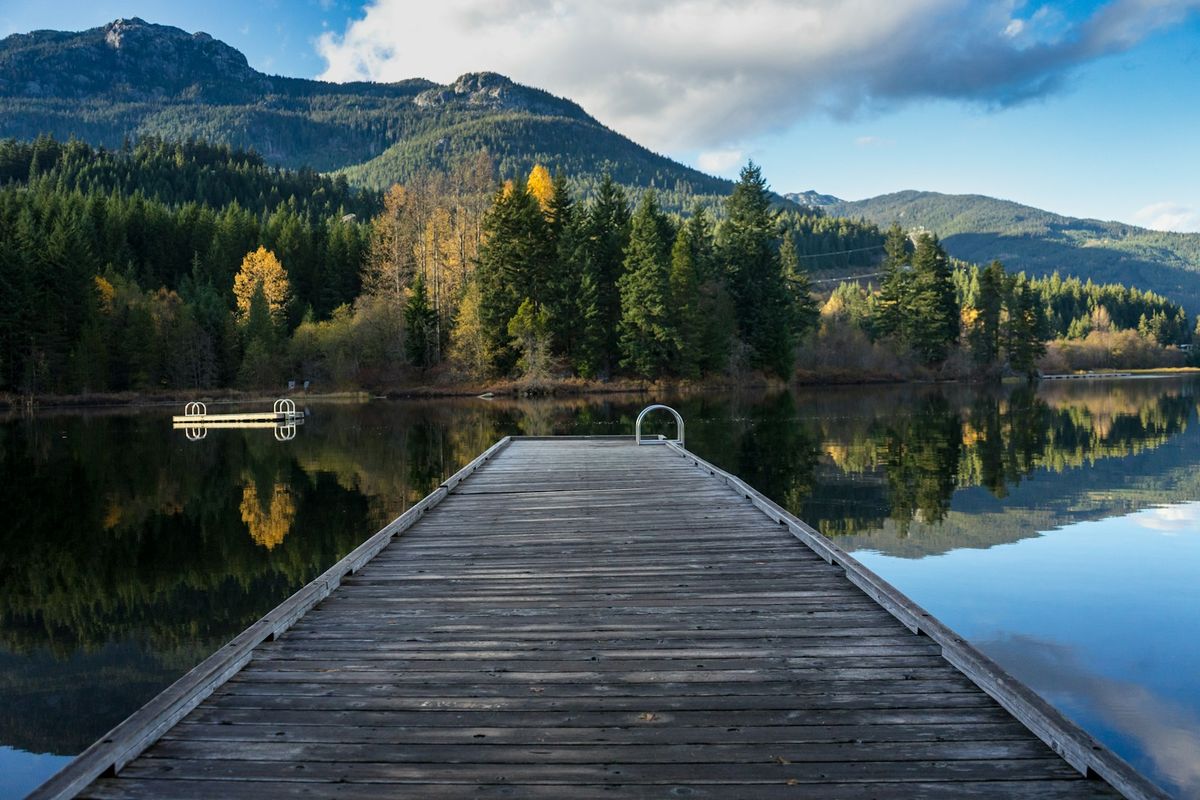 Dock on Alta Lake near Whistler with mountains behind