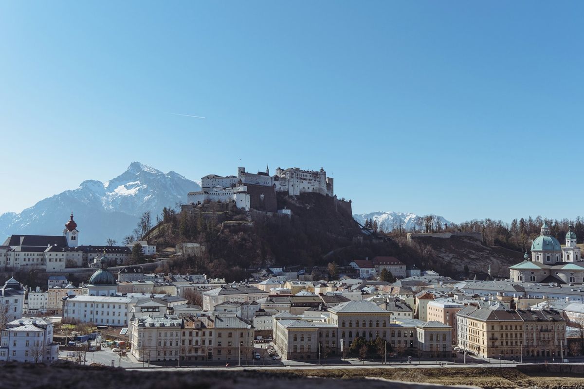 View of Salzburg city with castle on a hill in the background