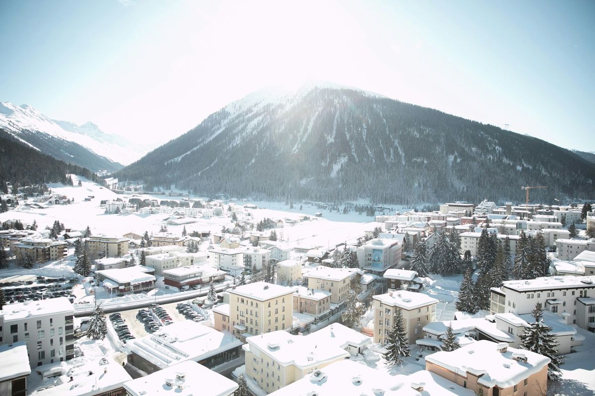 Aerial view of Davos winter valley town near the mountains