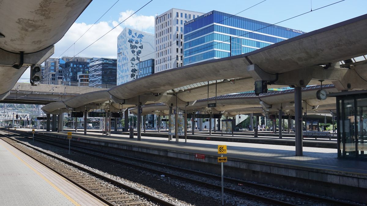 Platform at Oslo Central Station (Oslo S) with the Barcode skyline behind