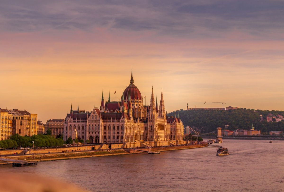 Hungarian parliament building at sunrise over the Danube river Budapest