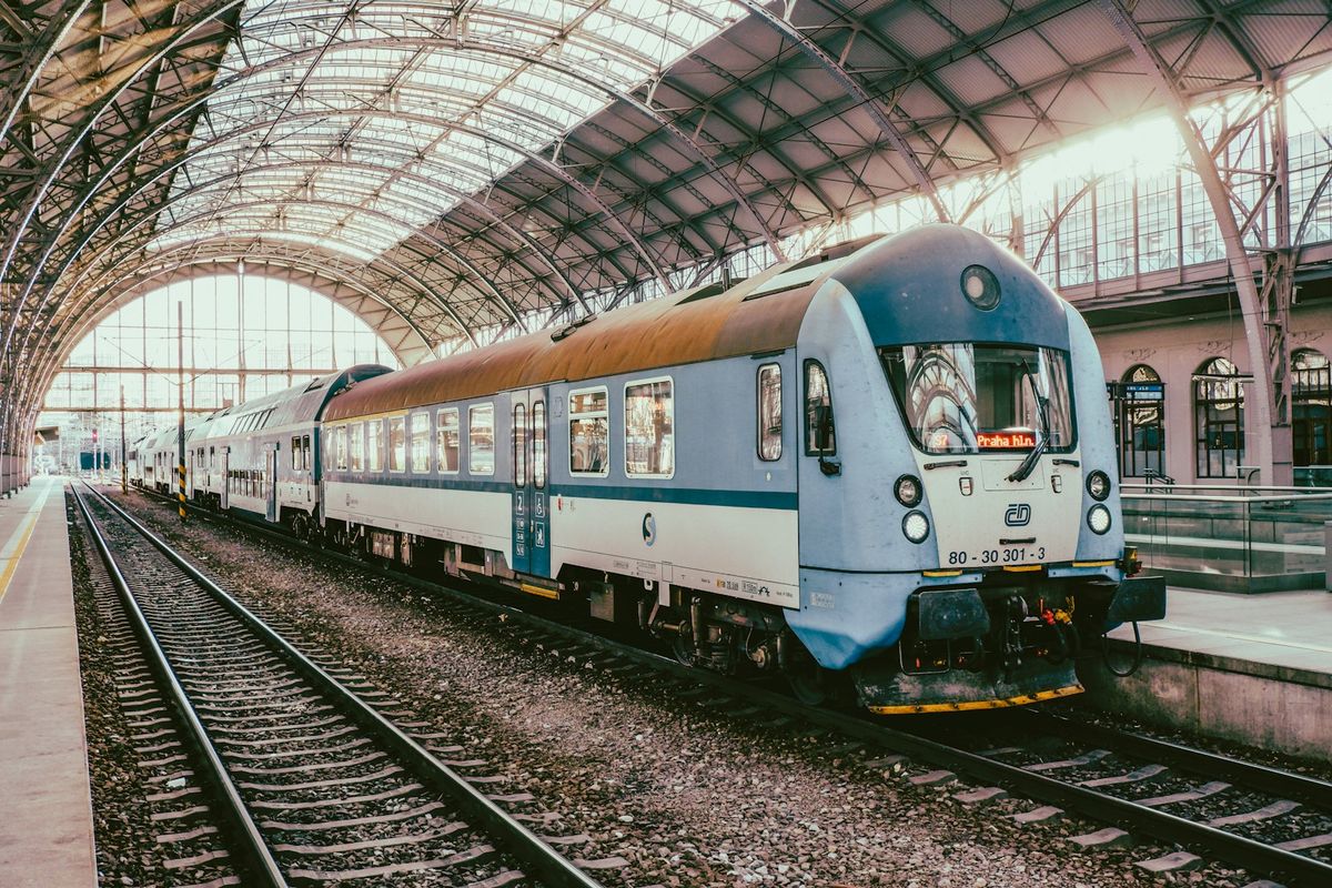 Passenger train arriving at central European station