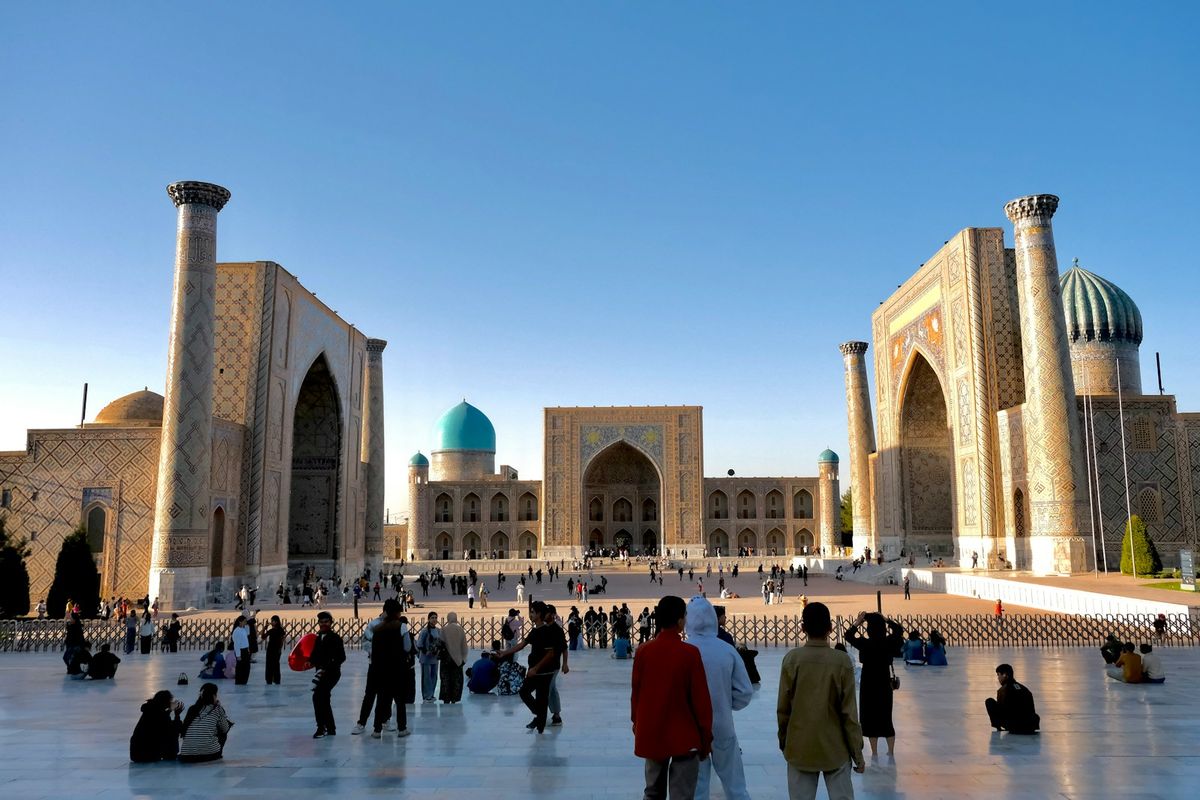 People gathered in the historic Registan square in Samarkand Uzbekistan
