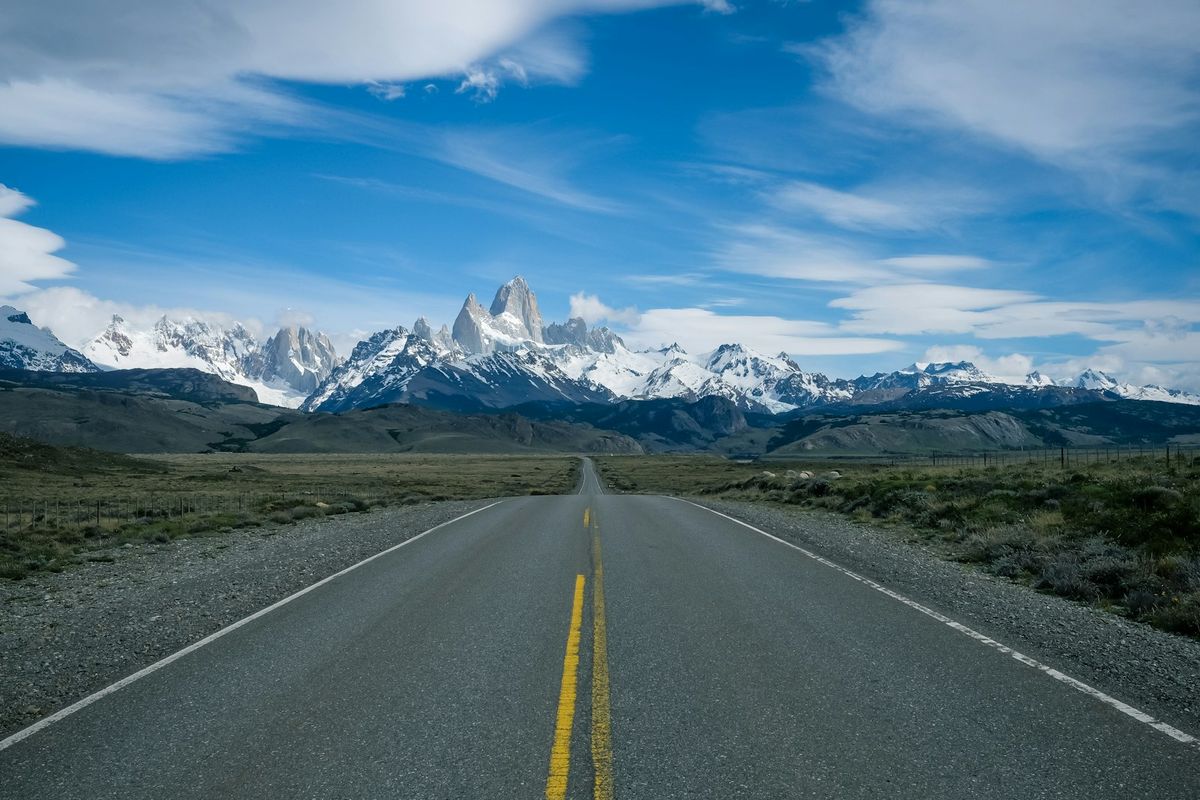 Mountain road cutting through rugged Andean landscape in South America