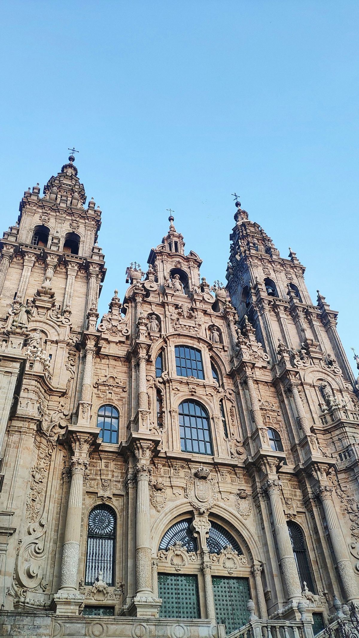 Santiago de Compostela cathedral facade under a clear blue sky